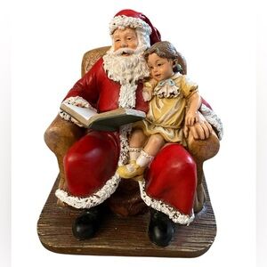 Santa Reading to Little Girl Figurine.